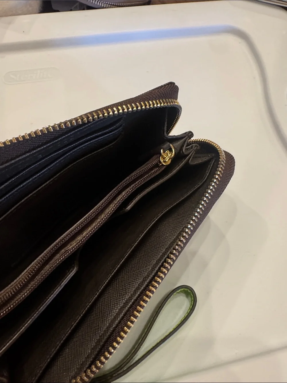 Michael Kors Brown Monogram Wristlet with Lime Accent